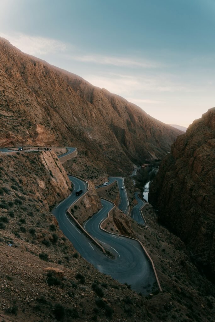 Tangier Airport Transfer: Getting to the City, Chefchaouen & Beyond (2026 Guide) Winding mountain road through a canyon in northern Morocco