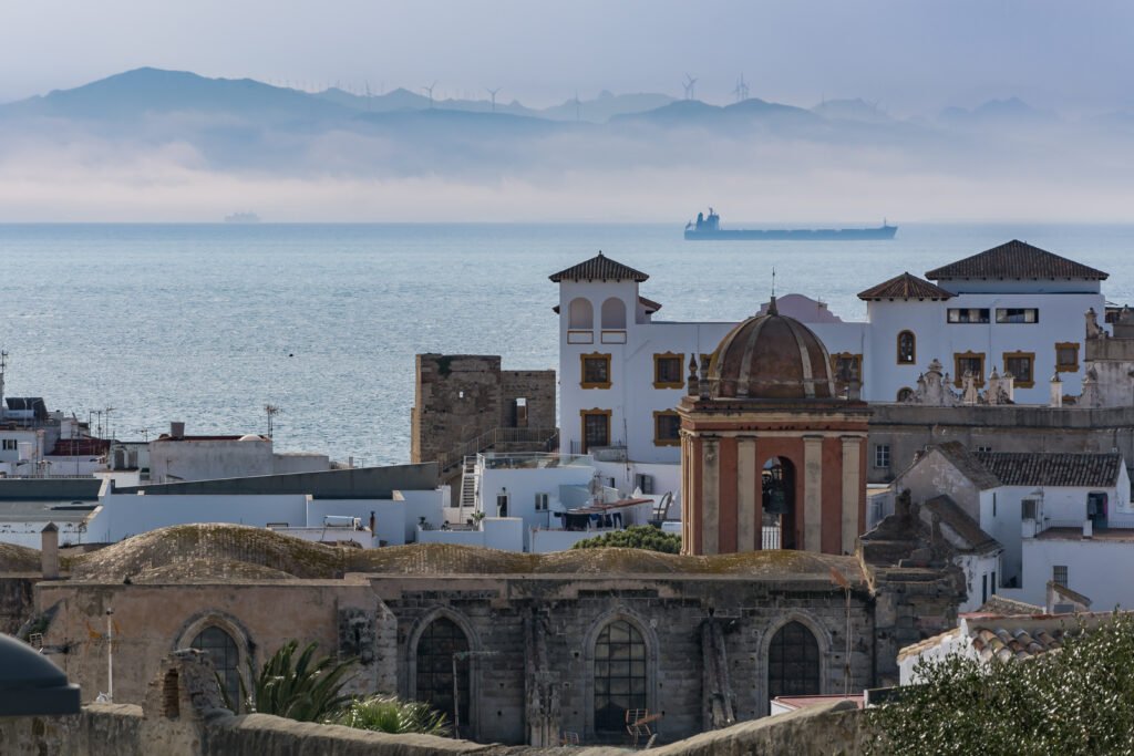 Seville to Tangier Day Trip: Is It Worth It? Tour vs DIY (2026 Guide) View across the Strait of Gibraltar toward Tangier, Morocco, from the Spanish side